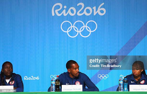 Track and field athletes Brittney Reese, Christian Taylor, and Allyson Felix of the United States attend a press conference at the Main Press Centre...