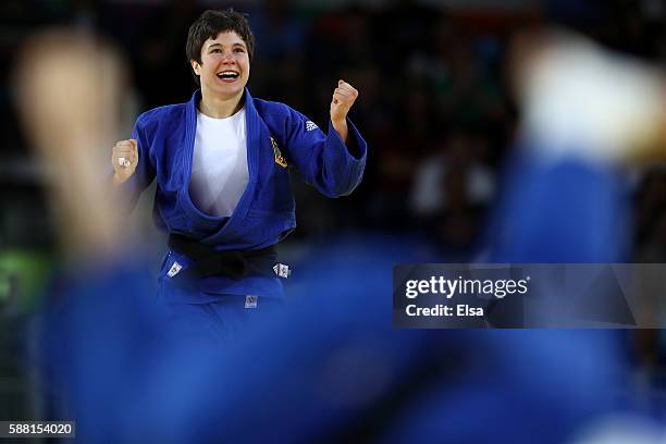 Laura Vargas Koch celebrates after defeating Bernadette Graf of Austria during a Women's -70kg Quarterfinal bout on Day 5 of the Rio 2016 Olympic...