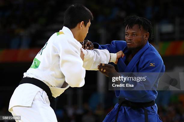 Donghan Gwak of Korea competes against Popole Misenga of the Refugee Olympic Team during a Men's -90kg bout on Day 5 of the Rio 2016 Olympic Games at...