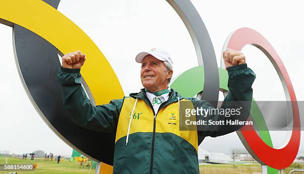 Golf legend Gary Player of South Africa poses near a set of Olympic rings during a practice round on Day 4 of the Rio 2016 Olympic Games at Olympic...
