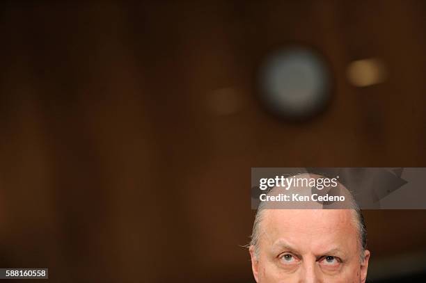 Deputy Secretary of State John Negroponte testifies during a hearing before the Senate Foreign Relations Committee's East Asian and Pacific Affairs...