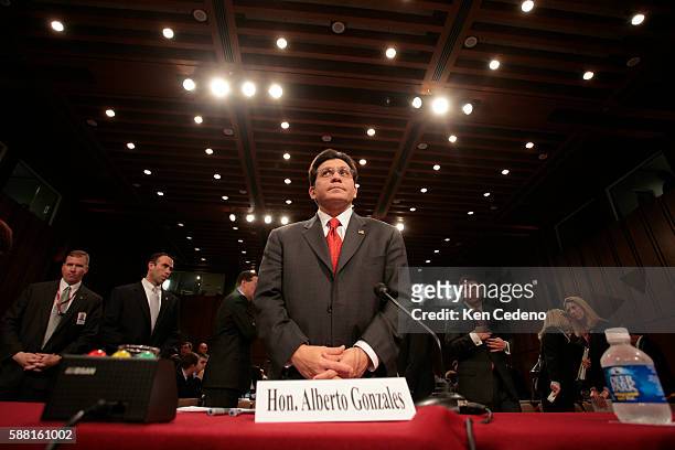 Attorney General Alberto Gonzales waits to be seated before returning to testify before a Senate Judiciary Committee hearing on his role in the...