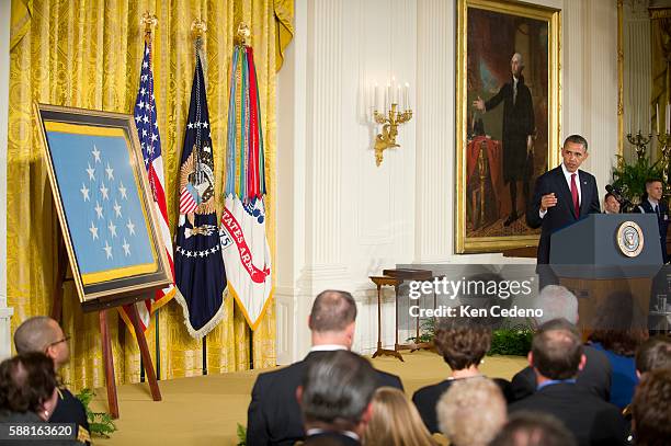 President Barack Obama speaks to guests in the East room of the White House prior to awarding Specialist Leslie H. Sabo, Jr., U.S. Army, the Medal of...