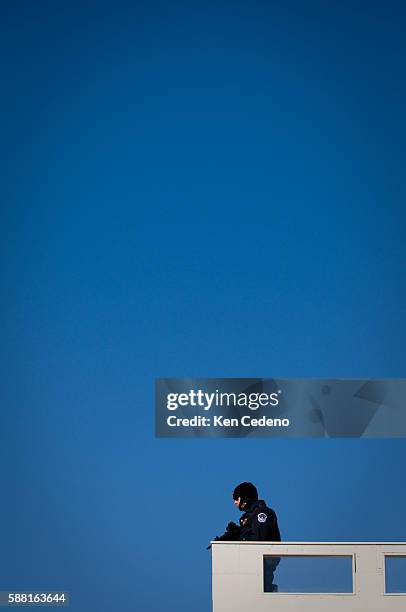 Security stands on a media riser, at the Capitol building, a few days before the swearing in of America's 44th president Barack Obama in Washington...