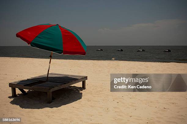 Beach chair is empty on a saturday afternoon on Gulfport beach near Ken Combs pier in Gulfport, LA., July 10, 2010. Deep Water Horizon spill has...