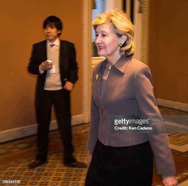 Sen. Kay Bailey Hutchinson, and due to retire after 20 years in the Senate, walks through the halls of the U.S. Capitol after a caucus meeting with...