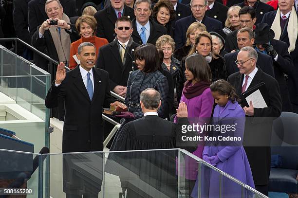 President Barack Obama is sworn by The Honorable John Roberts, Chief Justice of the United States during the 57th Presidential Inaugural ceremony at...