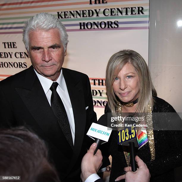 Singer, actress and director Barbra Streisand and her husband actor James Brolin arrive at the Kennedy Center for the Kennedy Center Honors.