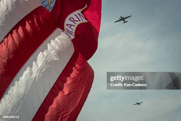 Vintage World War II planes fly over the National Mall during an array of other World War II aircraft ever assembled to fly over the National Mall...