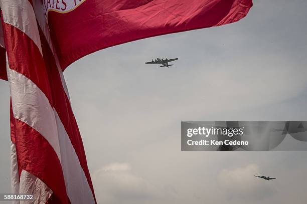 Vintage World War II planes fly over the National Mall during an array of other World War II aircraft ever assembled to fly over the National Mall...