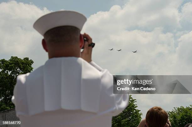 Navy Petty Officer Kevin Smith based in Baltimore, MD takes pictures of the most diverse array of World War II aircraft ever assembled performing a...