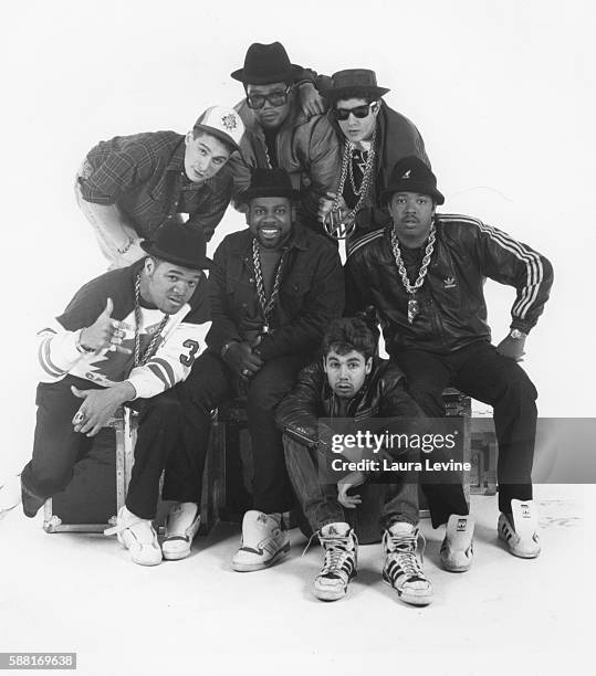 Ad-Rock, DMC, Mike D; Center: DJ Hurricane, Run, Jam Master Jay; Front: MCA.