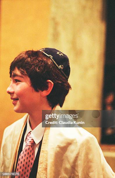 boy having bar mitzvah - bar mitzvah stock pictures, royalty-free photos & images