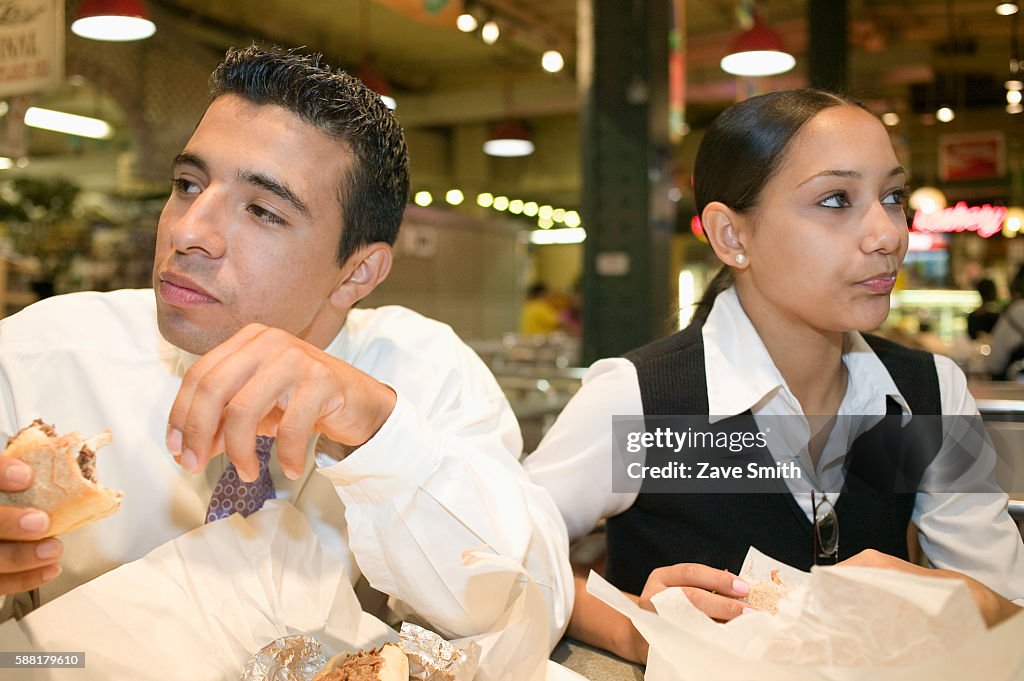 Young Couple Eating Fast Food