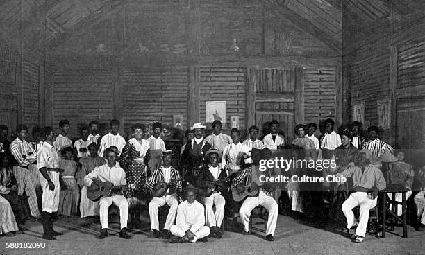 La Case de loncle Tom / Uncle Toms Cabin - scene from a play based on Harriet Beecher Stowe s novel - scene with a group of slaves, some with...