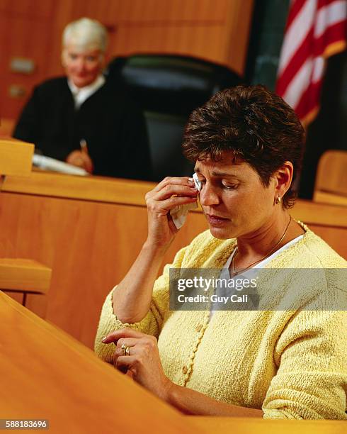 witness crying at stand - witness stock pictures, royalty-free photos & images