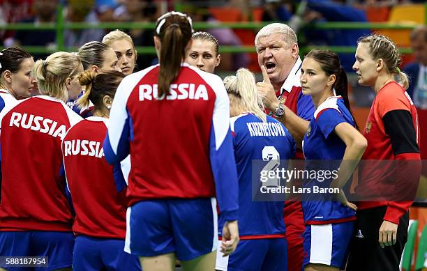 Head coach Evgenii Trefilov of Russia gives instructions during the Womens Preliminary Group B match between Russia and Sweden at Future Arena on...