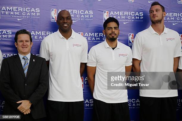 Raul Zarraga General Manager of NBA Mexico poses for pictures with NBA players Quincy Pondexter, Jorge Gutierrez and Danilo Gallinari during a NBA...