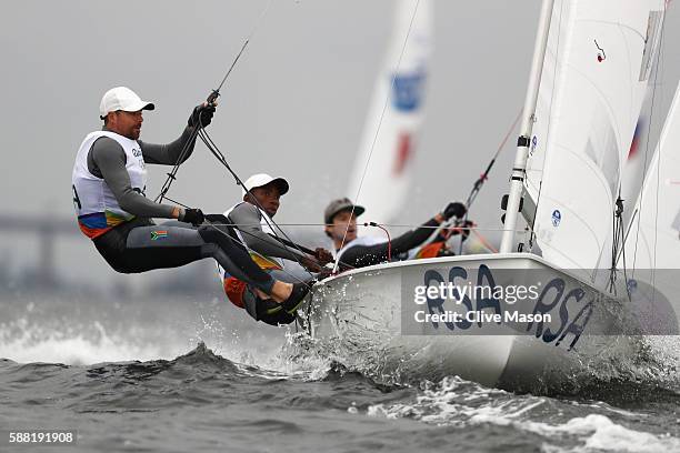 Asenathi Jim of South Africa and Roger Beresford Hudson of South Africa compete in the Men's 470 class on Day 5 of the Rio 2016 Olympic Games at the...