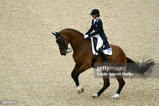 Yvonne Losos de Muniz of Dominican Republic riding Foco Loco W during the Dressage Individual Grand Prix event on Day 5 of the Rio 2016 Olympic Games...