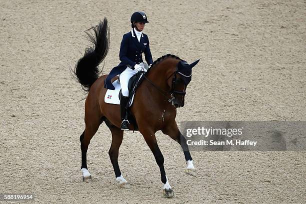 Yvonne Losos de Muniz of Dominican Republic riding Foco Loco W during the Dressage Individual Grand Prix event on Day 5 of the Rio 2016 Olympic Games...