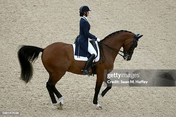 Yvonne Losos de Muniz of Dominican Republic riding Foco Loco W during the Dressage Individual Grand Prix event on Day 5 of the Rio 2016 Olympic Games...