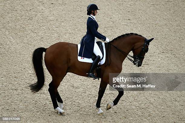 Yvonne Losos de Muniz of Dominican Republic riding Foco Loco W during the Dressage Individual Grand Prix event on Day 5 of the Rio 2016 Olympic Games...