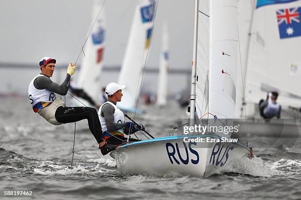 Pavel Sozykin of Russia and Denis Gribanov of Russia compete in the Men's 470 class on Day 5 of the Rio 2016 Olympic Games at the Marina da Gloria on...