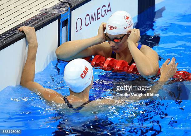 Chantel Van Landeghem and Penny Oleksiak of Canada following the Women's 100m Freestyle Heats on Day 5 of the Rio 2016 Olympic Games at the Olympic...