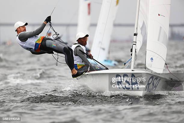 Asenathi Jim of South Africa and Roger Beresford Hudson of South Africa compete in the Men's 470 class on Day 5 of the Rio 2016 Olympic Games at the...