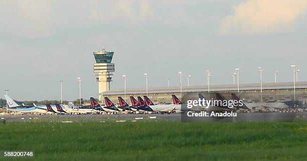 Airliners are seen at park positions after a hoax bomb call for Scandinavian Airlines' planes at Brussels International Airport in Brussels, Belgium...
