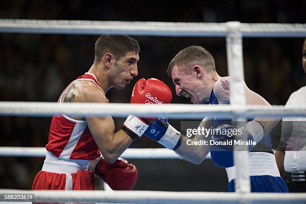 Summer Olympics: Ireland Patrick Barnes in action vs Spain Samuel Carmona Heredia during Men's Light Flyweight 46-49kg fight at Riocentro. Rio de...