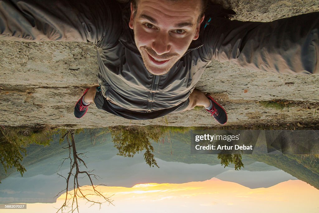 Taking a selfie up side down on the nature