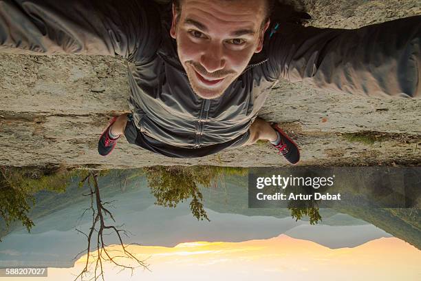 taking a selfie up side down on the nature - virtualitytrend stock pictures, royalty-free photos & images