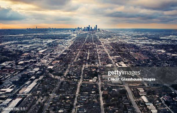 skyline and surrounding landscape with dramatic sky, houston, texas, usa - harris county stock pictures, royalty-free photos & images
