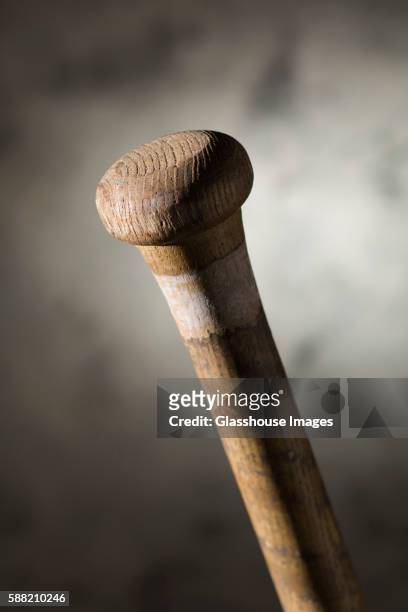 old wooden baseball bat - bate fotografías e imágenes de stock