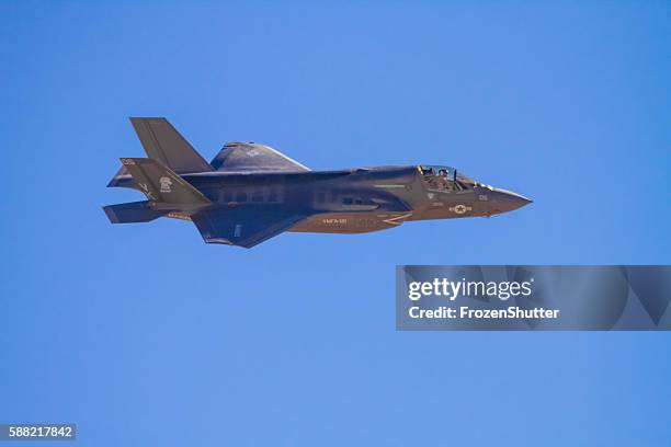 lockheed martin f-35 lightning ii aircraft at airshow - f 35 fighter stock pictures, royalty-free photos & images