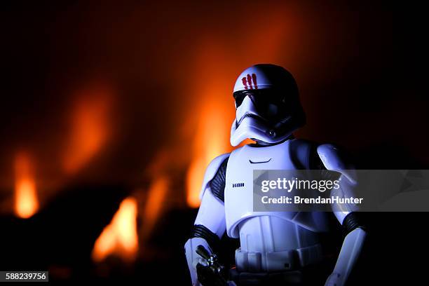 burning treason - stormtrooper star wars stock pictures, royalty-free photos & images