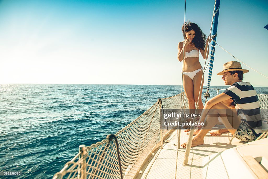 Friends summer vacation: on a sailing yacht