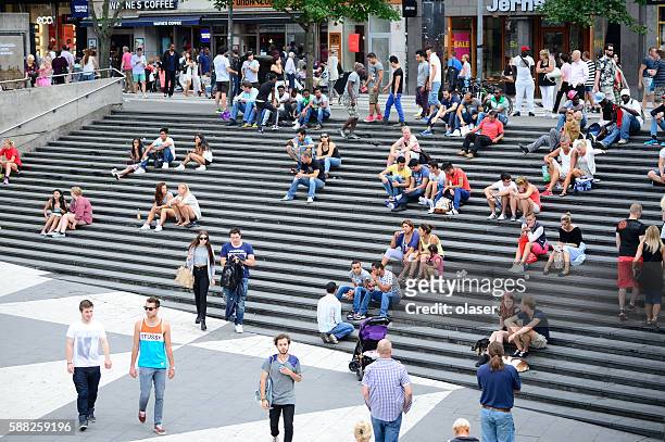 people on city square sergels torg, stockholm - stockholm stockfoto's en -beelden