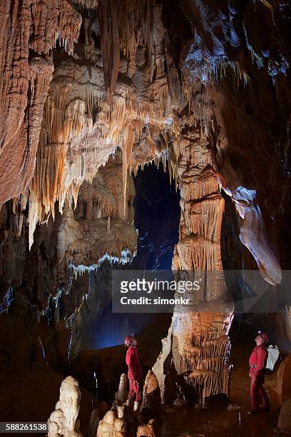 geologist in cave - stalagmite stock pictures, royalty-free photos & images