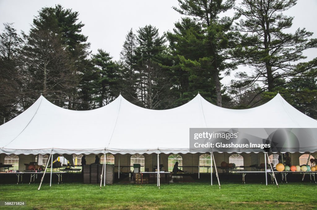 Wedding Tent on Grass Beneath Trees