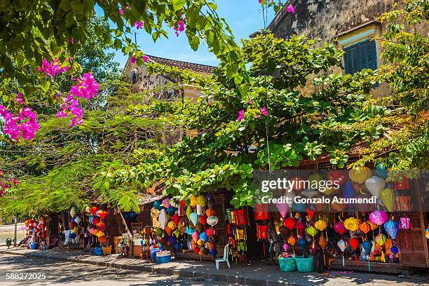 traditional silk hanging lanterns in hoi an. - hoi an vietnam stock pictures, royalty-free photos & images