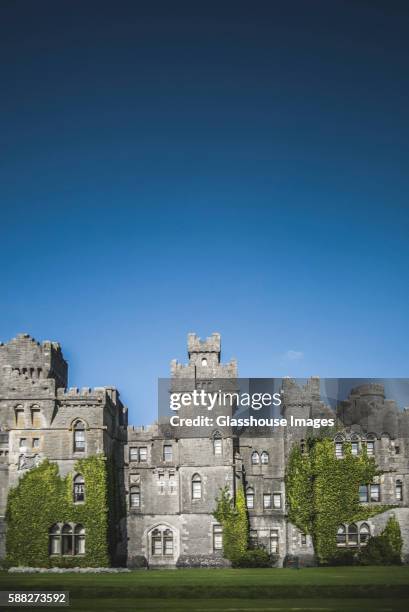 ashford castle with ivy growing on wall, cong, ireland - ashford stock pictures, royalty-free photos & images