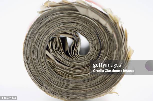 wad of money - money roll stock pictures, royalty-free photos & images