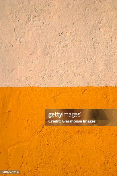 beige and gold wall, close up - segno di uguale foto e immagini stock