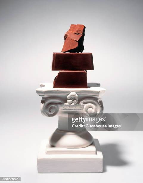 chocolate chunks on pedestal - food sculpture stock pictures, royalty-free photos & images