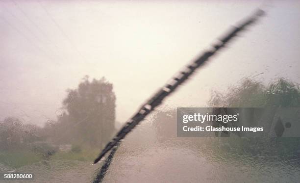 windshield wiper in the rain - driving in fog stock pictures, royalty-free photos & images