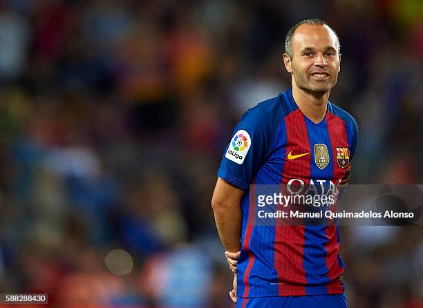 Andres Iniesta of FC Barcelona celebrates after winning the Joan Gamper trophy match between FC Barcelona and UC Sampdoria at Camp Nou on August 10,...