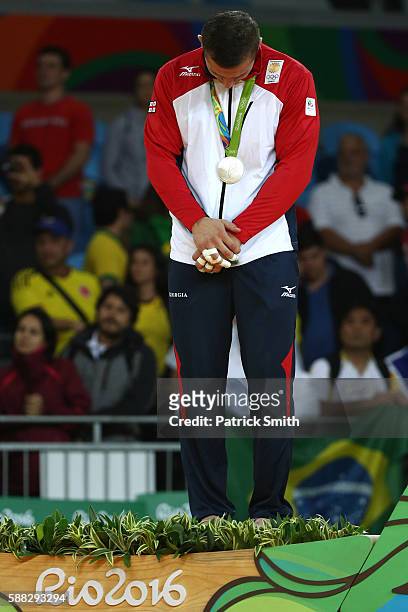 Silver medalist Varlam Liparteliani of Georgia stands on the podium during the medal ceremony for the Men's -90kg Judo on Day 5 of the Rio 2016...